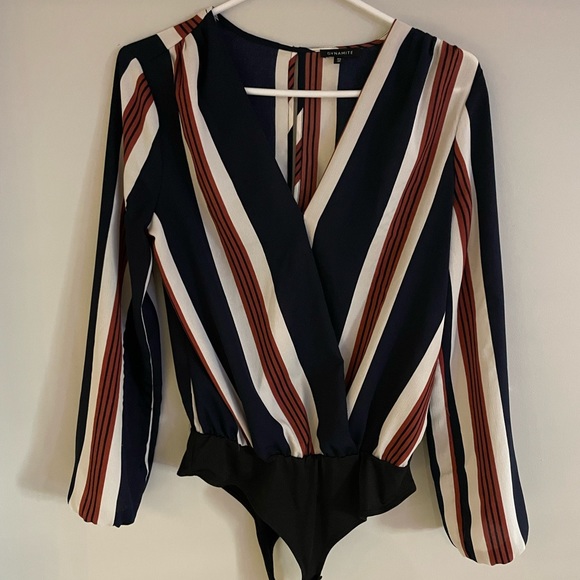 Small stripped body suit from dynamite. - Picture 1 of 4